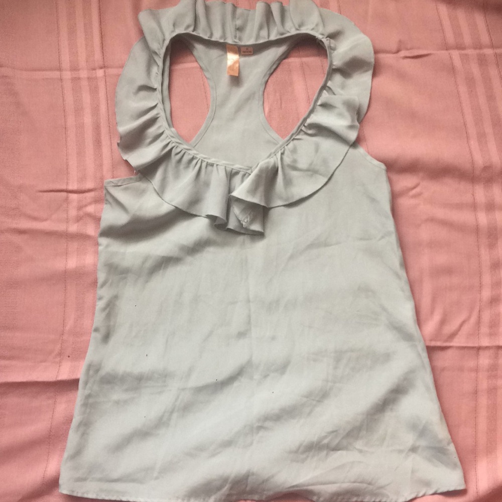Light grey v-neck top with ruffled collar